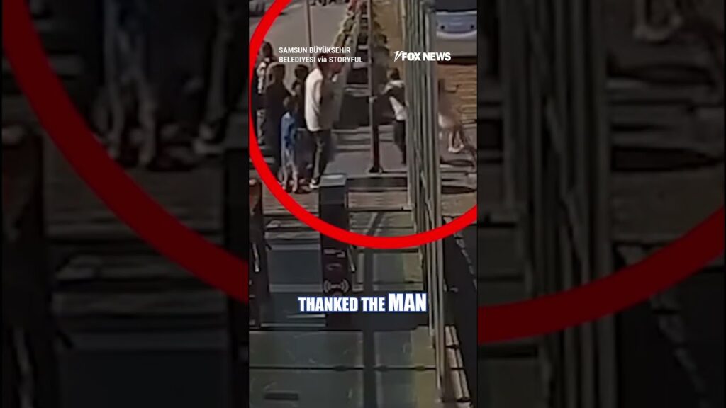WATCH: Man SAVES child from running in front of ONCOMING train #shorts #world #news #viral