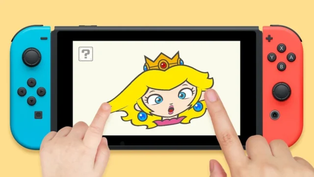 Nintendo Switchの画面で「かおピーチ」のピーチの顔をさわる様子
