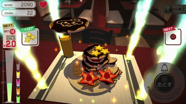 爆盛食堂のゲーム画面。皿にパンケーキと苺、星を積み上げている