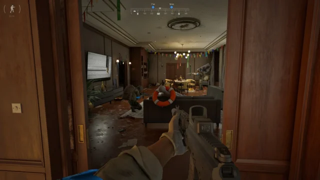 グレーゾーン ウォーフェアの屋内を銃を構えて進む一人称視点のゲーム画面