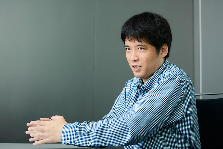 ザ・ボス戦のCQC周りに施した仕様変更の意図と内容について、KONAMI開発エンジニアの方が解説している様子